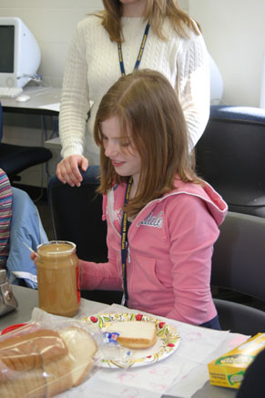 Making Peanut butter & jelly sandwiches