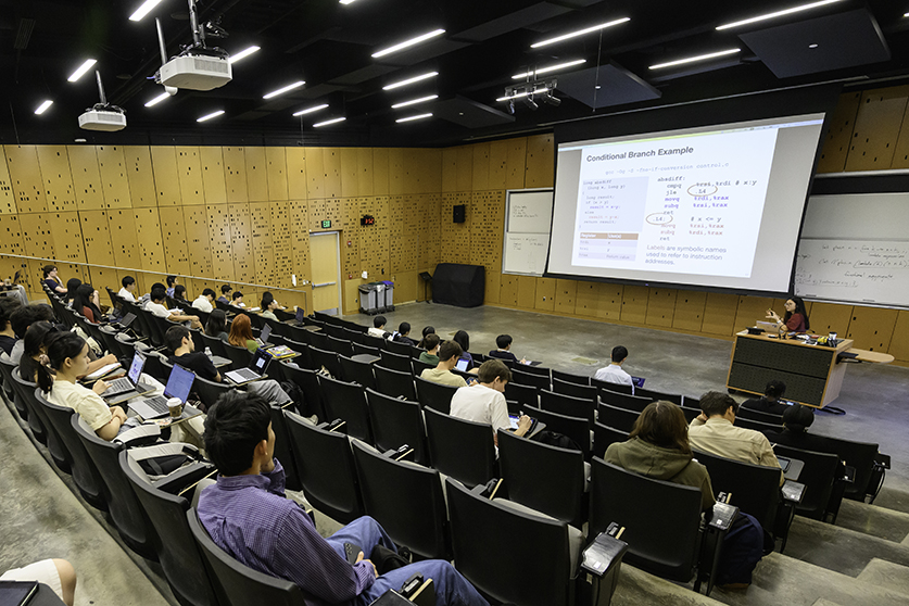 A professor lecturing to a class.