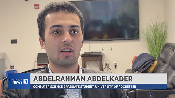 Abdelrahman Abdelkader talking to news camera