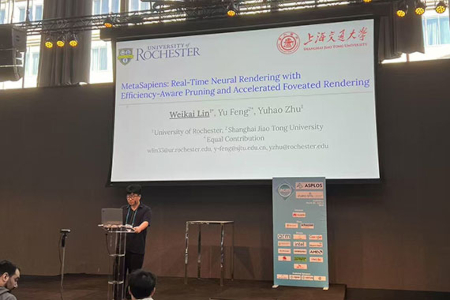 Speaker at podium presenting in front of large projector screen