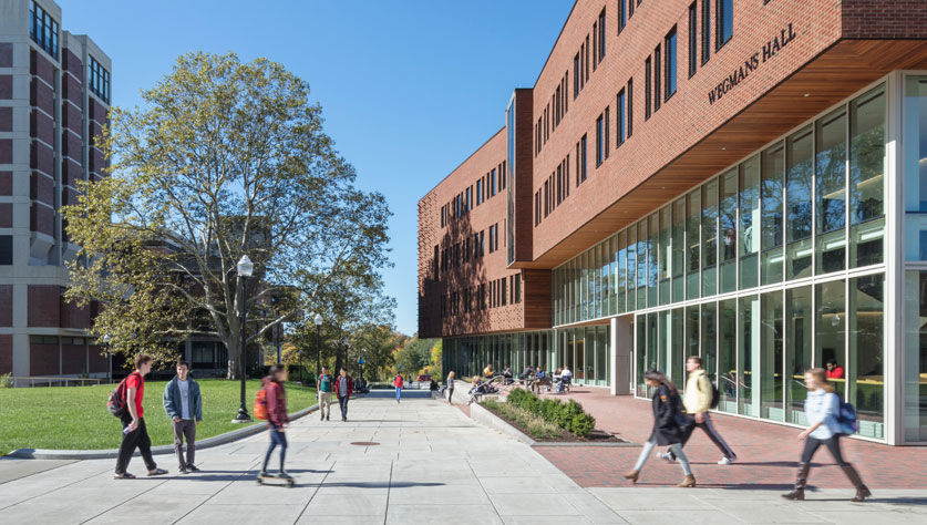 students walking outside Wegmans Hall