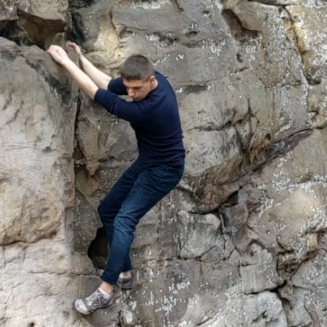 A photo of me climbing on a rock wall in Moss Rock Nature Preserve, Hoover, Alabama