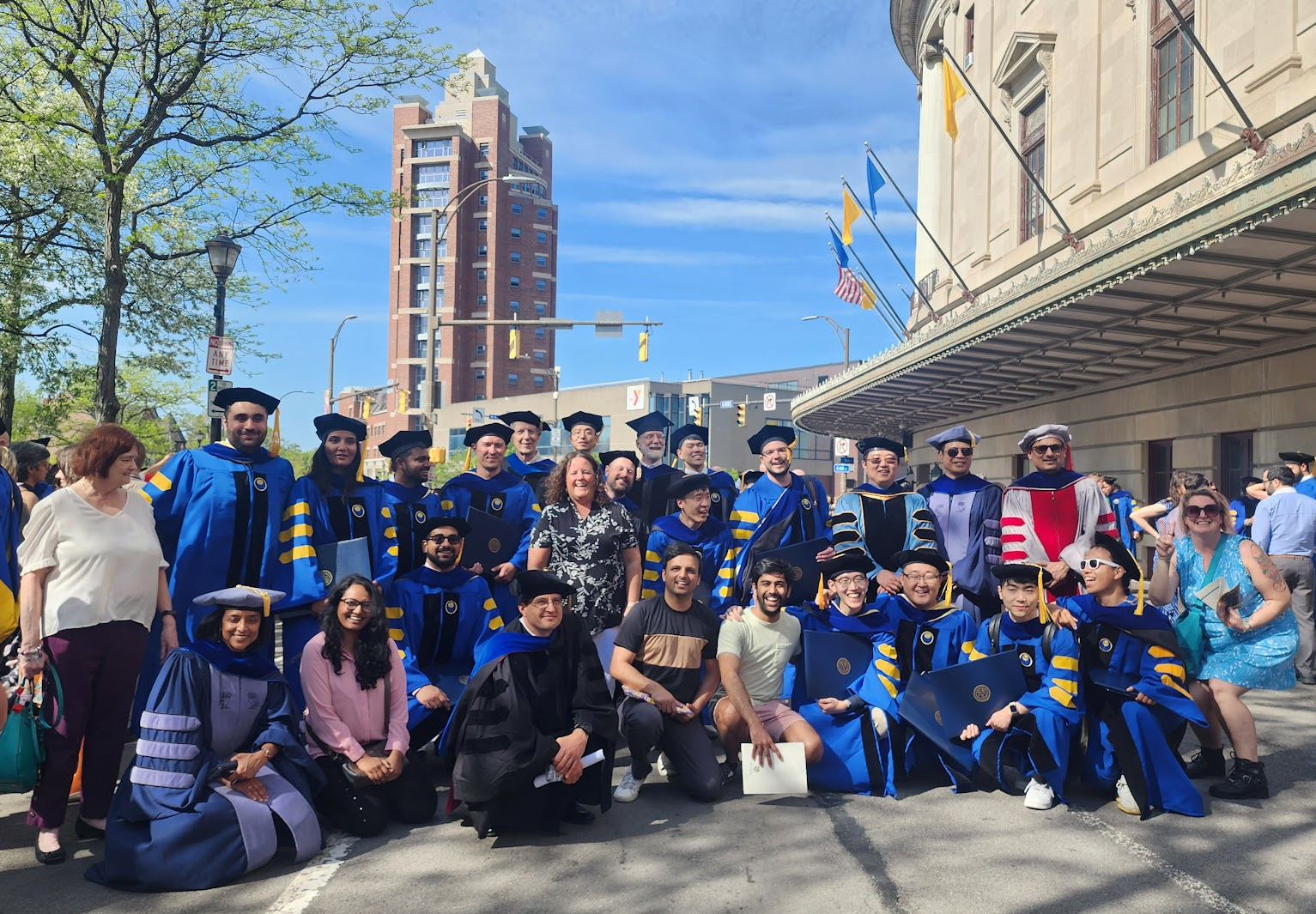 2023 PhD graduates outside at commencement 