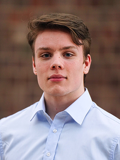 Headshot of Alexander Martin.