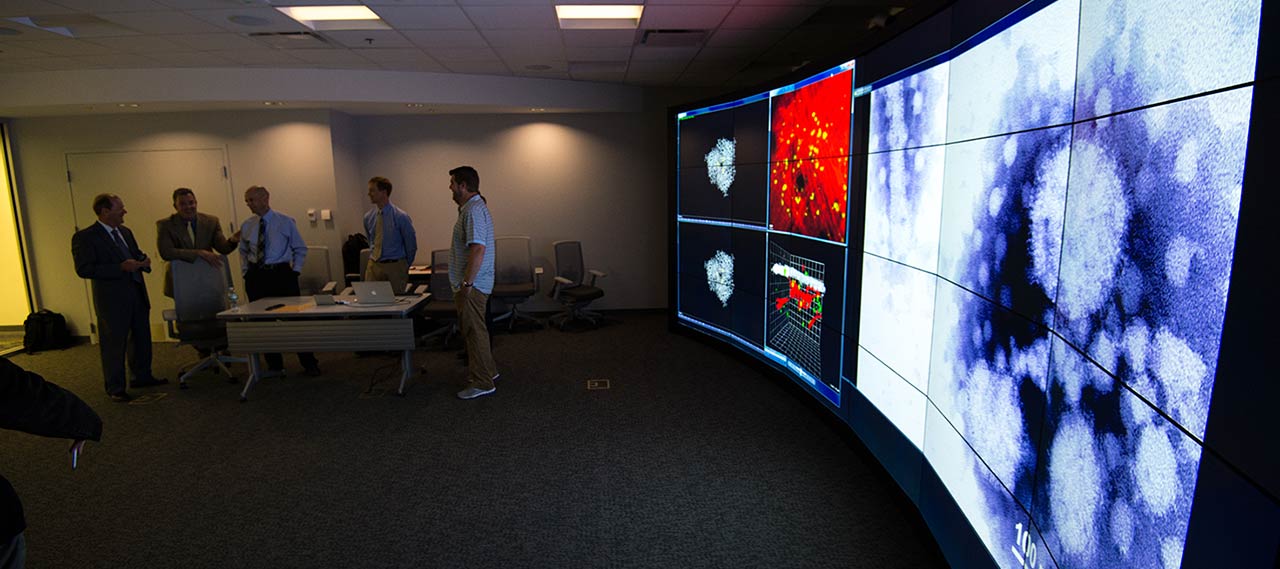 Five people using the VISTA Collaboratory screen